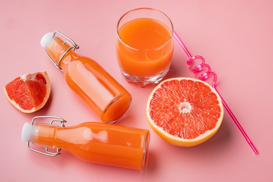 grapefruit juice set pink textured summer background 249006 11925